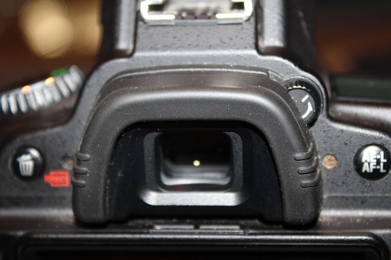 Image of a closeup of a Nikon D90 focusing on a viewfinder